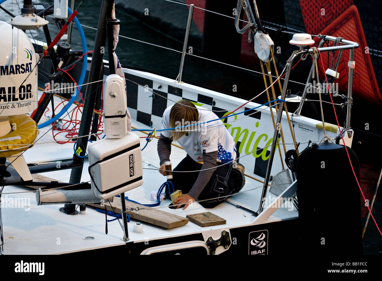 Volvo Ocean Race 2008-2009. Crew member of 'Telefonica Black' repairing the starboard rudder. Stock Photo