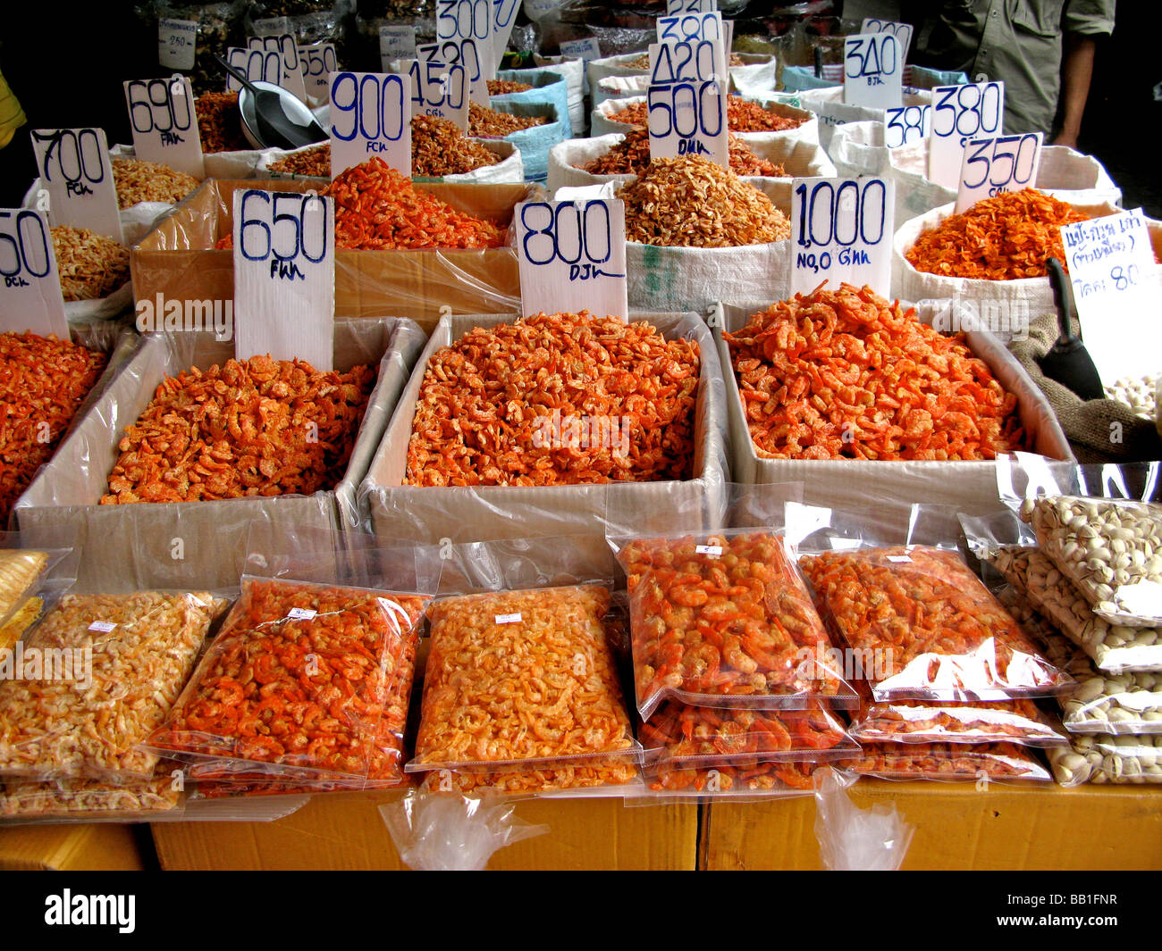 Market stall selling dried food Thailand Stock Photo