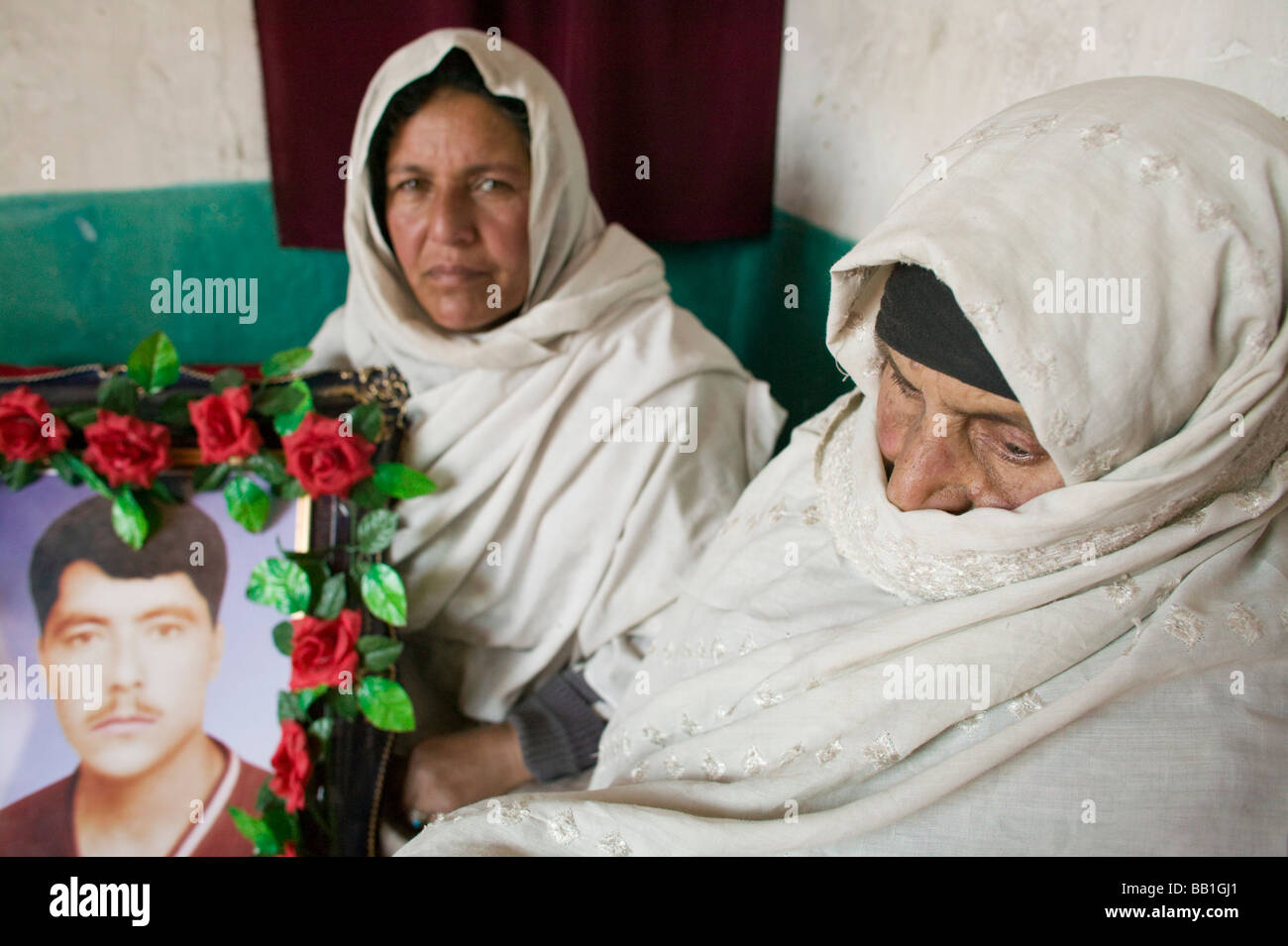 Grieving mother with picture of deceased son, Kabul, Afghanistan Stock ...