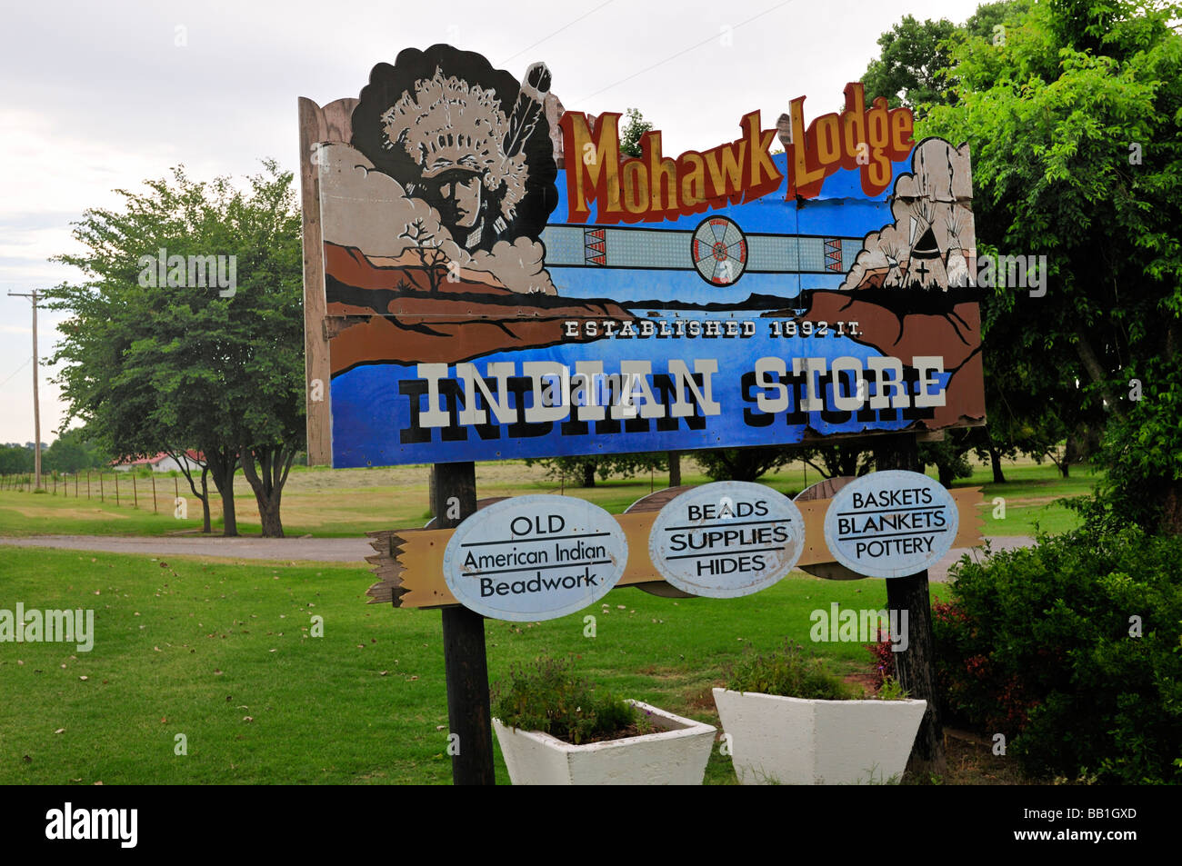Sign announcing the Mohawk Lodge Indian Store in Clinton Oklahoma Stock Photo