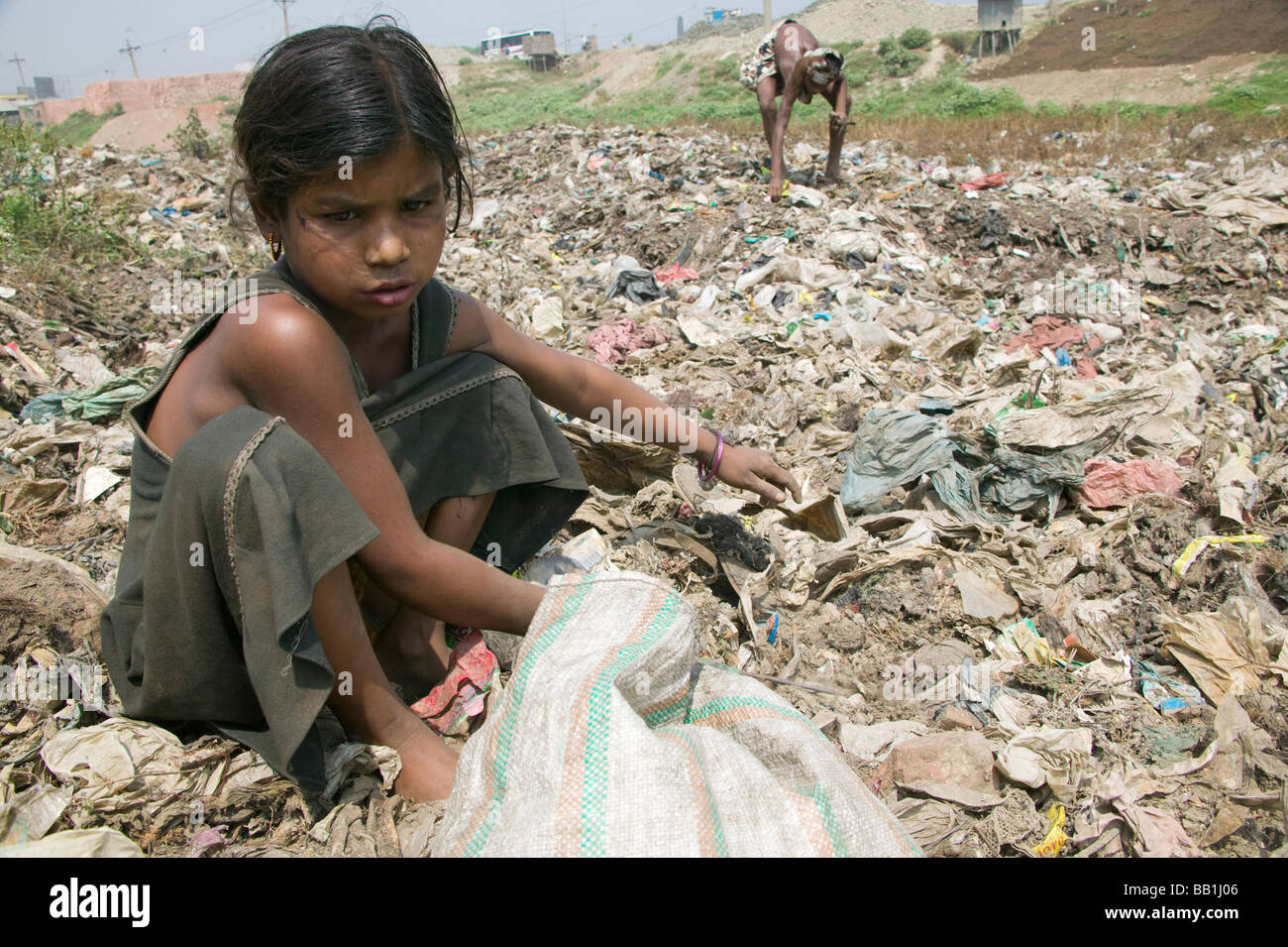 Children scavenging in garbage dump, Dhaka, Bangladesh Stock Photo - Alamy