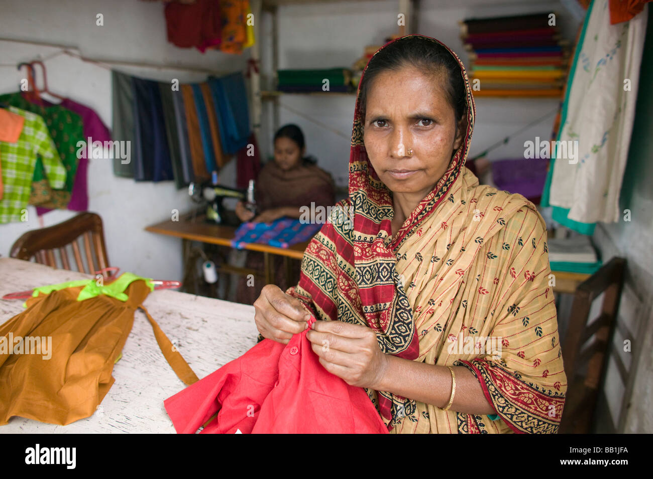 Women at clothing store, Mipur Village, outside of Dhaka, Bangladesh Stock Photo Alamy