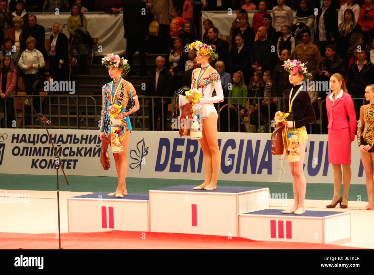 Ukraine's rythmic gymnastic star Anna Bessonova enjoys award ceremony on podium at Deriuguina Cup in Kyiv, Ukraine Stock Photo