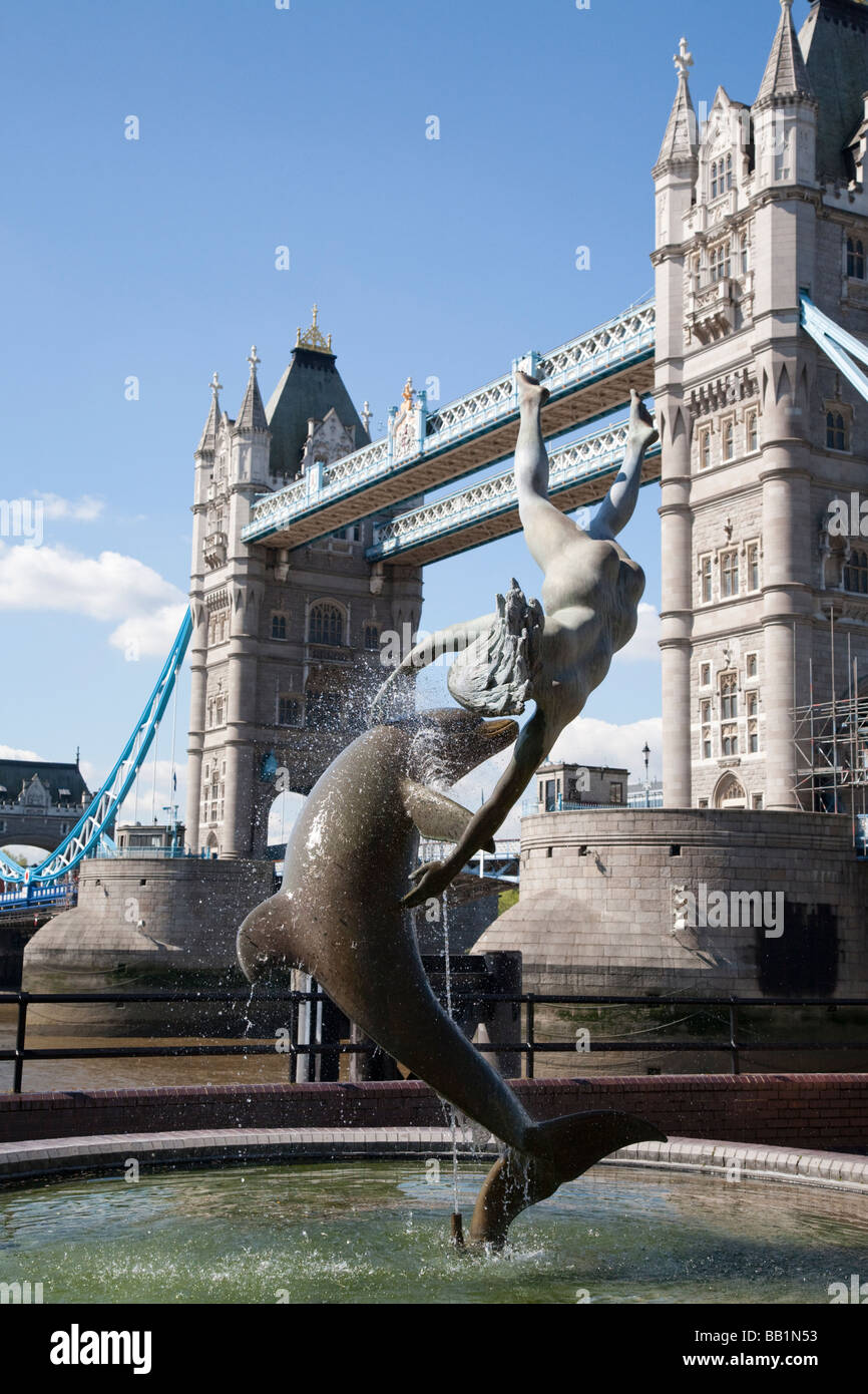 Girl with a dolphin by David Wynne 1973, London Tower Bridge England UK Stock Photo