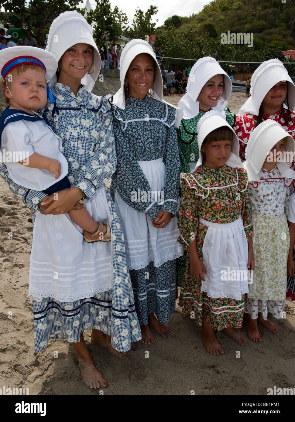 Young women and girls in traditional costume and bonnets Saint Louis  Festival Corossol St Barts Stock Photo - Alamy