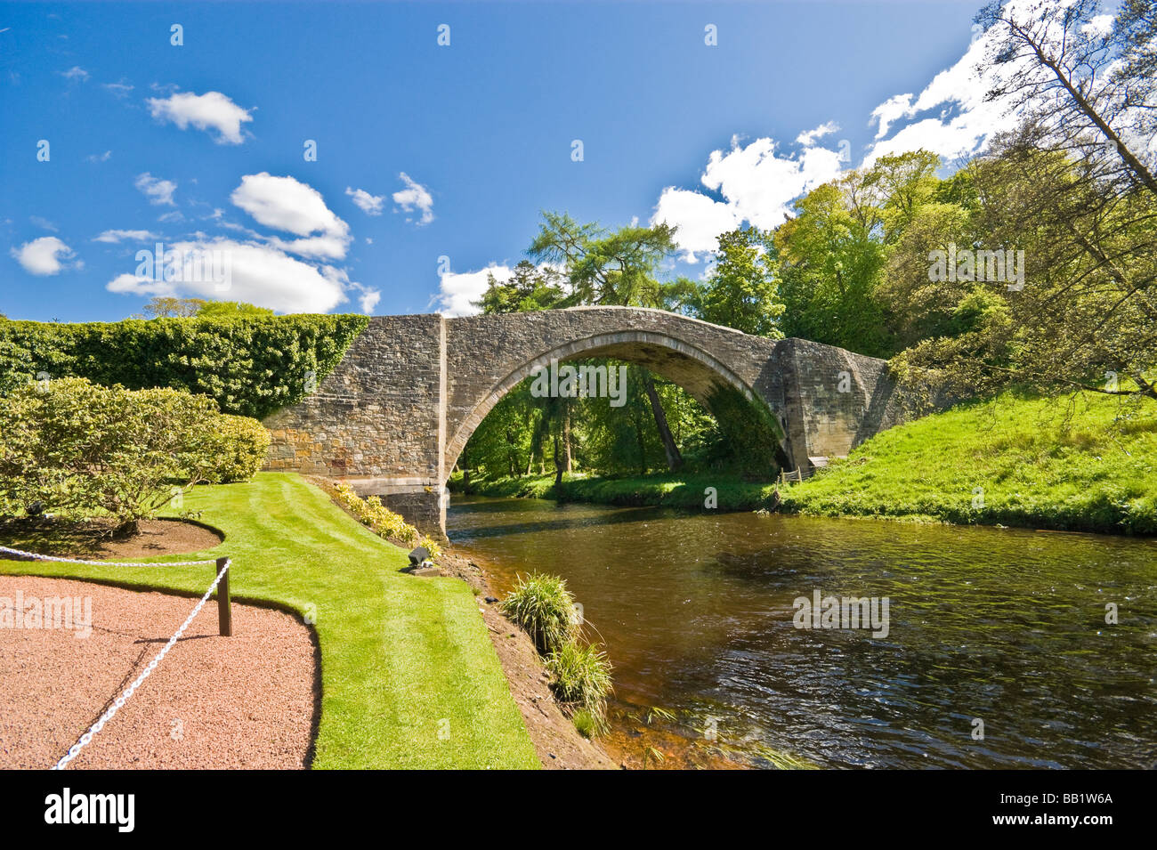 Medieval Brig O’Doon at the Burns National Heritage Park in Alloway Scotland spanning the River Doon Stock Photo