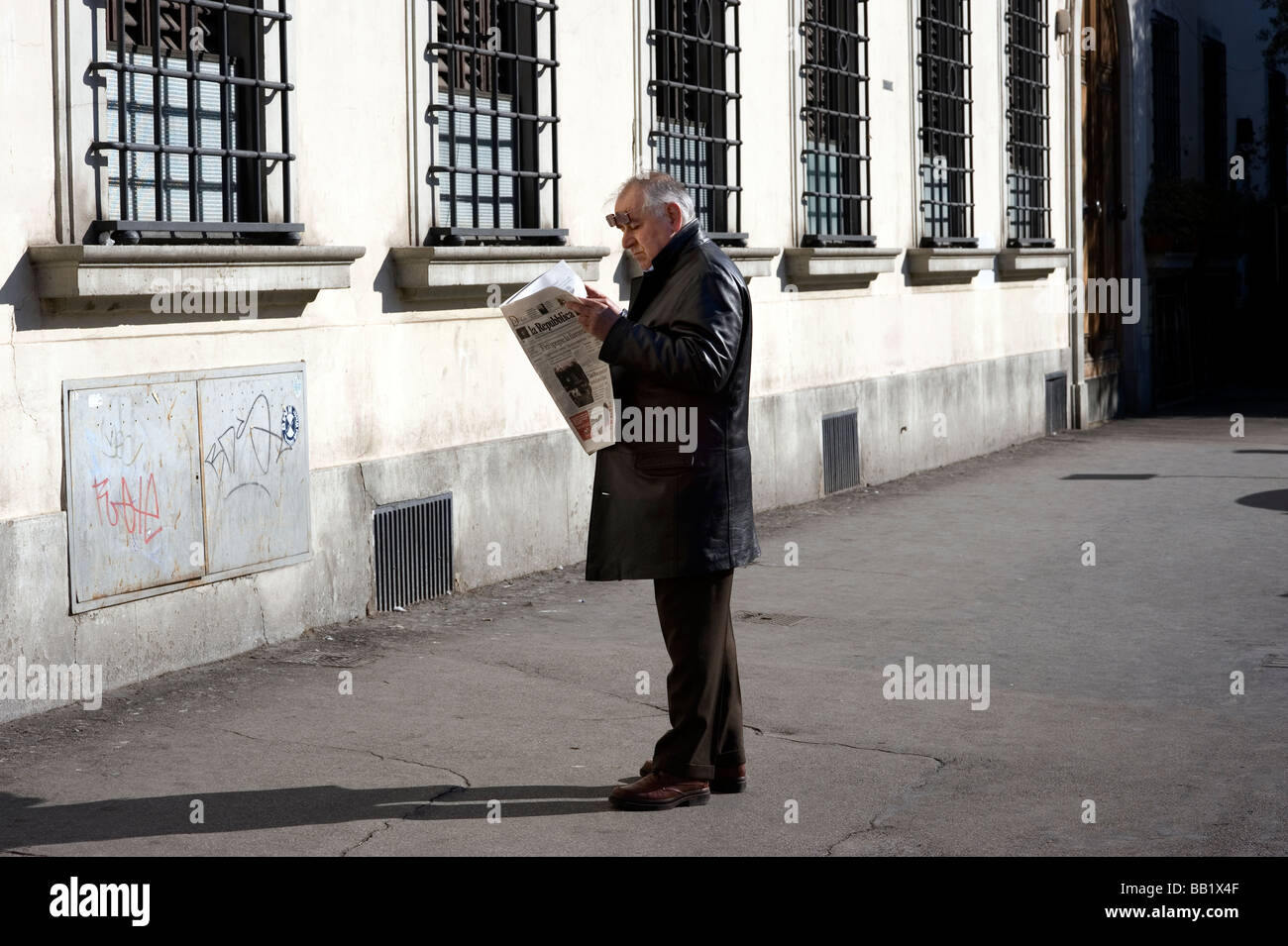 La Republica Newspaper man reading Florence Firenze Italy Tuscany Toscana Renaissance Art Culture Stock Photo