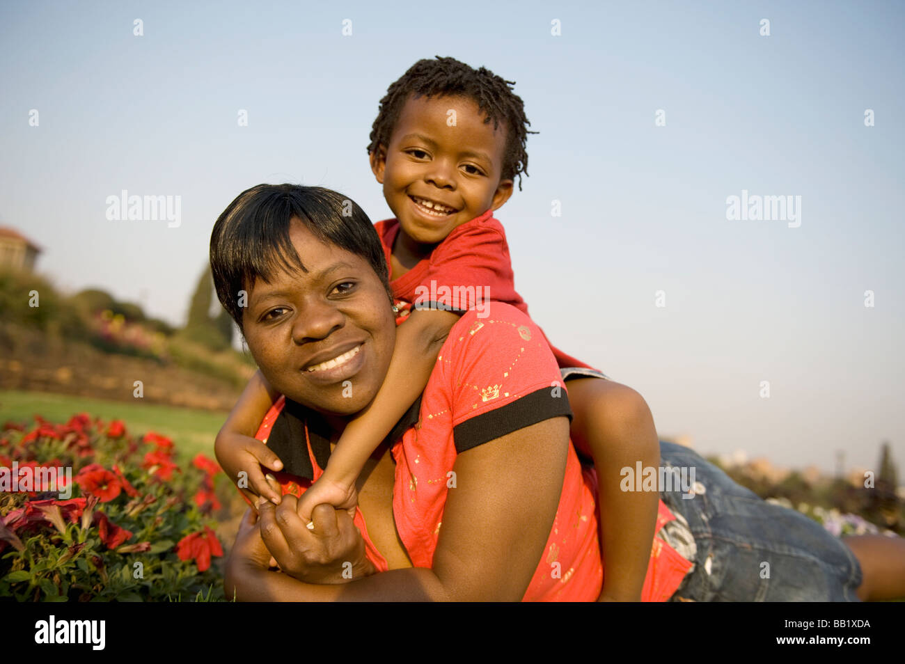 Mother and son in the garden, South Africa Stock Photo