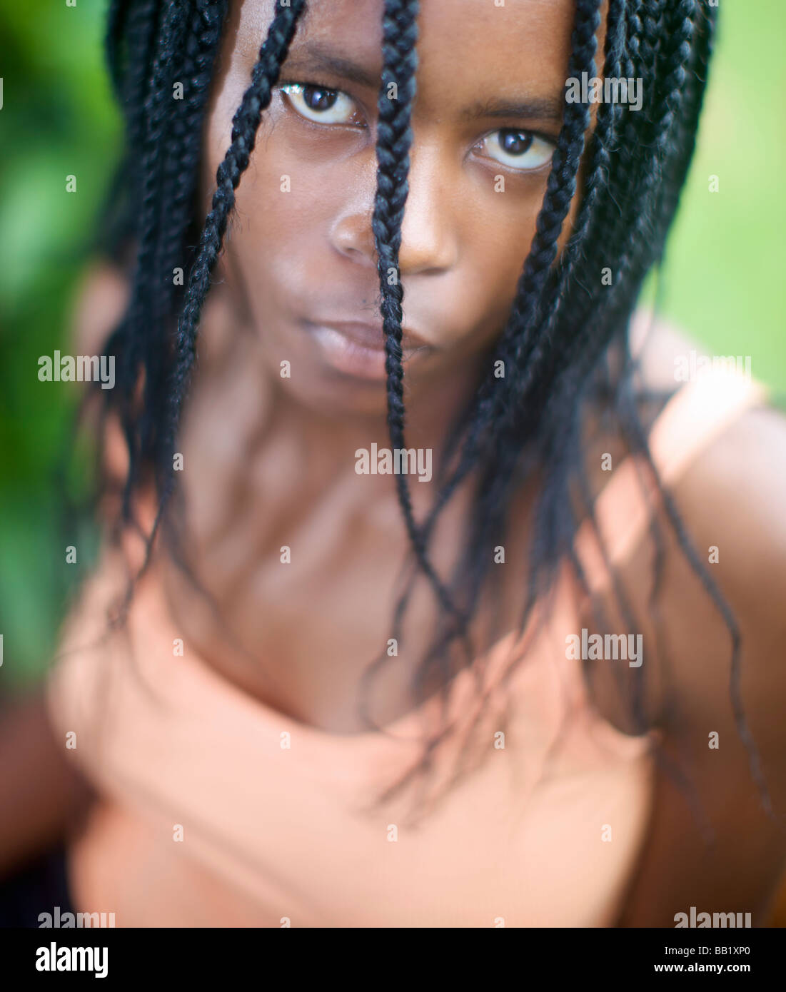 Serious black woman dreadlocks hi-res stock photography and images - Alamy