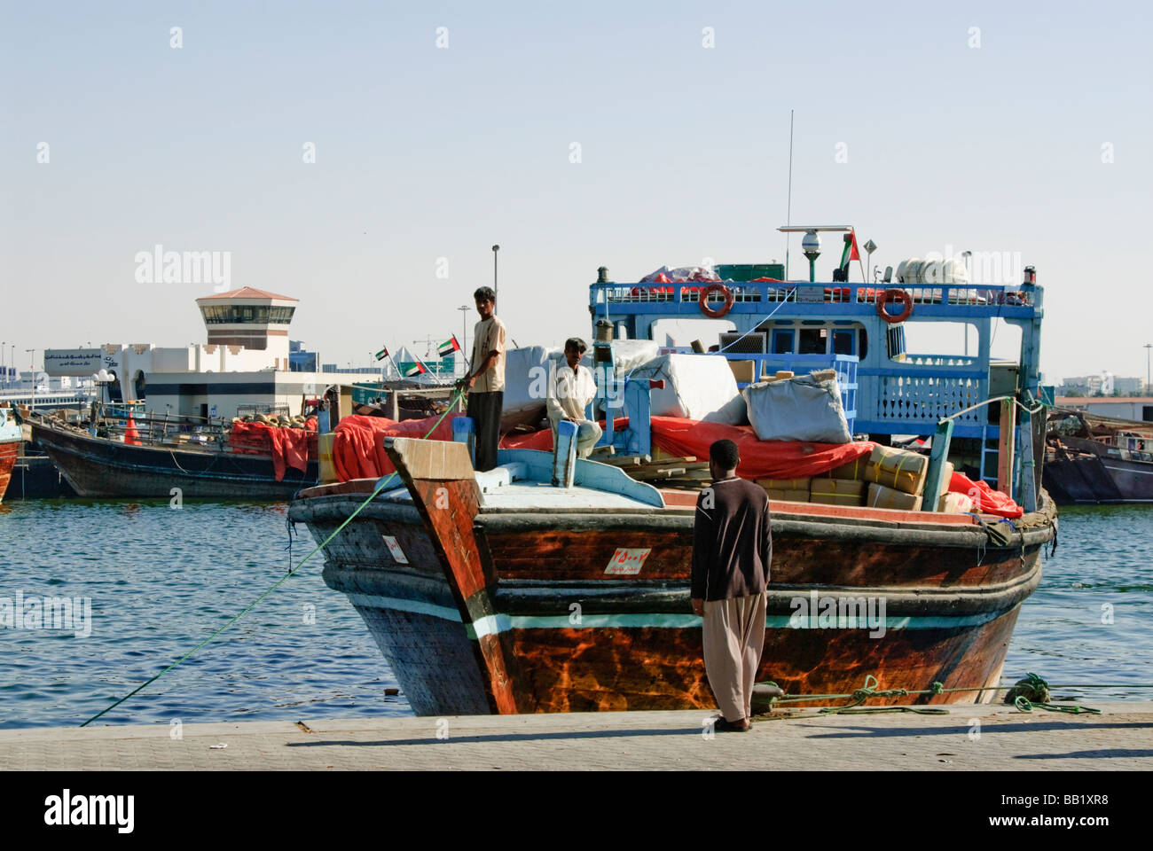 Dhow, a cargo vessel at the Creek during landing, Dubai, United Arab Emirates Stock Photo