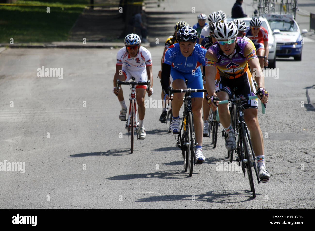 professional bike riders in road street race in city town Stock Photo ...