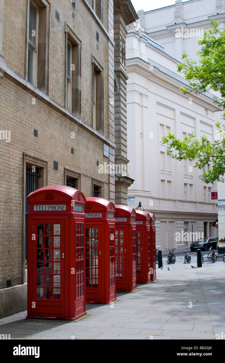 A row of red telephone boxes stand outside Bow Street Magistrates Court in London Stock Photo