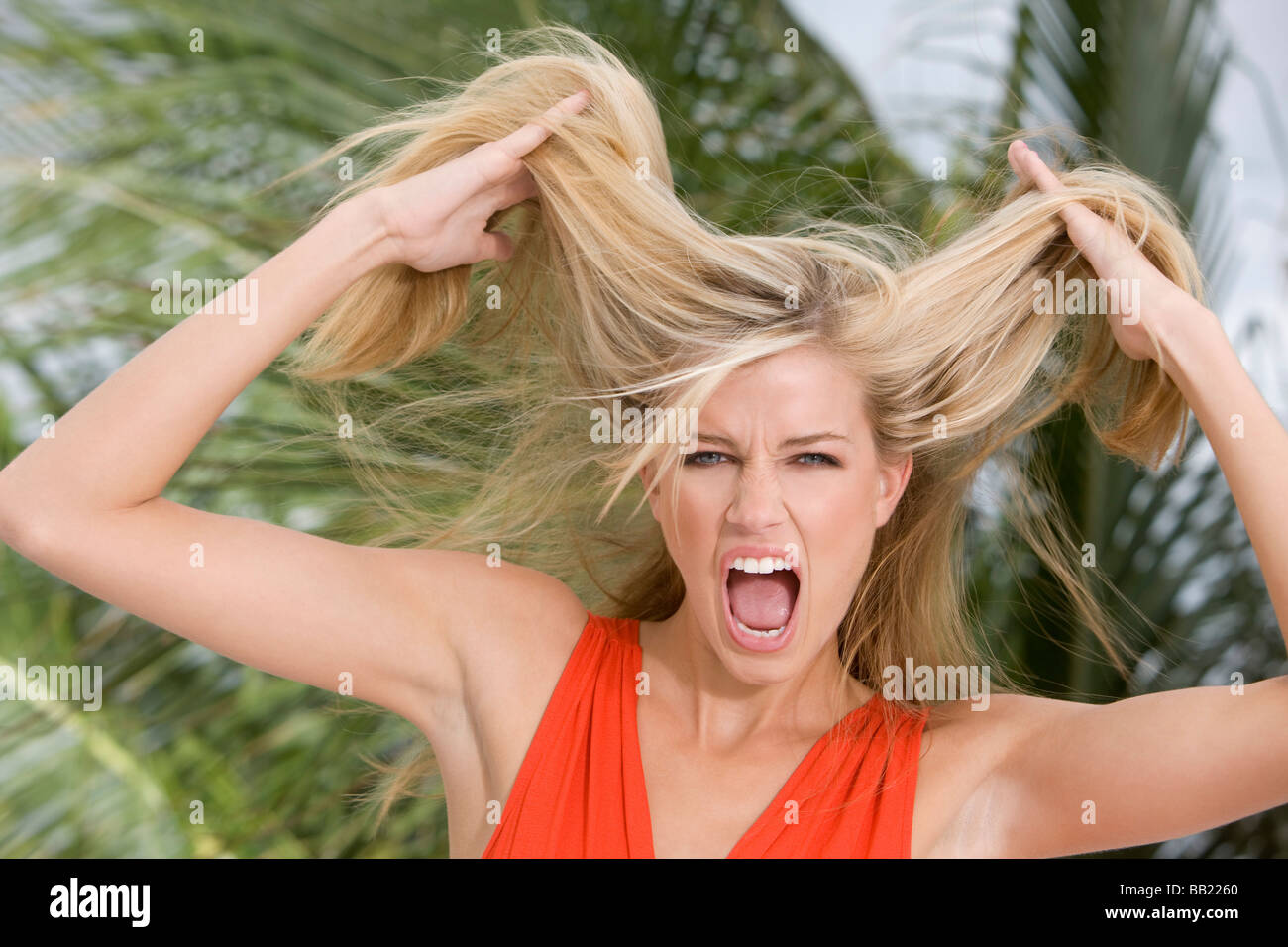 Portrait of a woman shouting Stock Photo