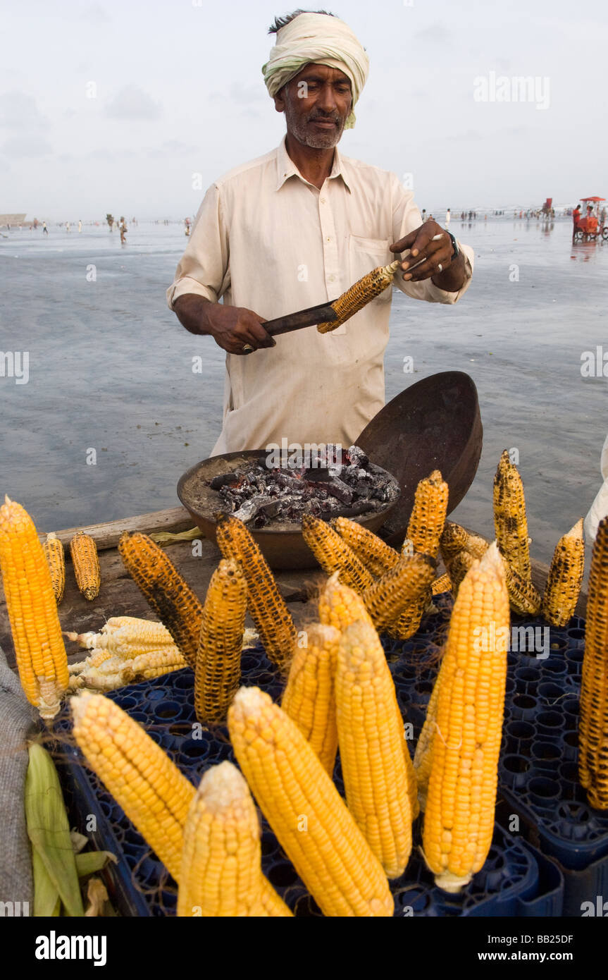 Selling corn on Clifton beach Karachi Pakistan Stock Photo Alamy