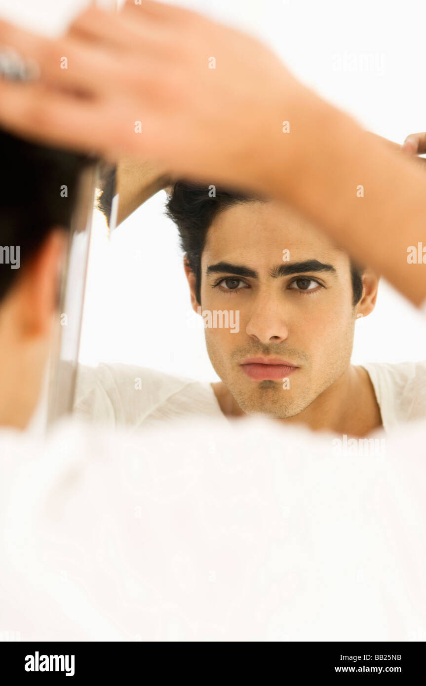 Reflection of a man in the mirror Stock Photo Alamy