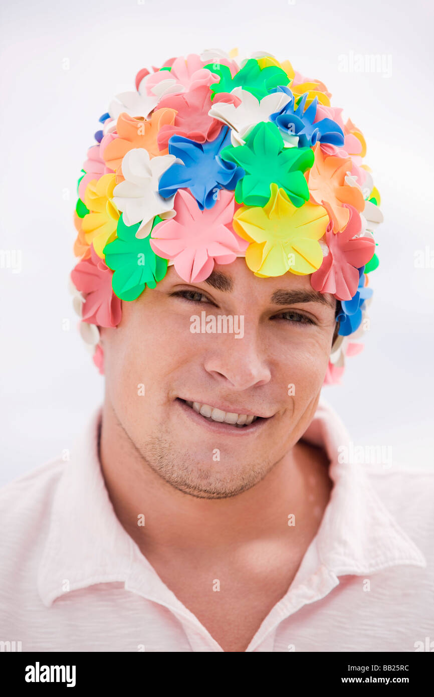 Portrait of a man wearing a flower cap Stock Photo - Alamy