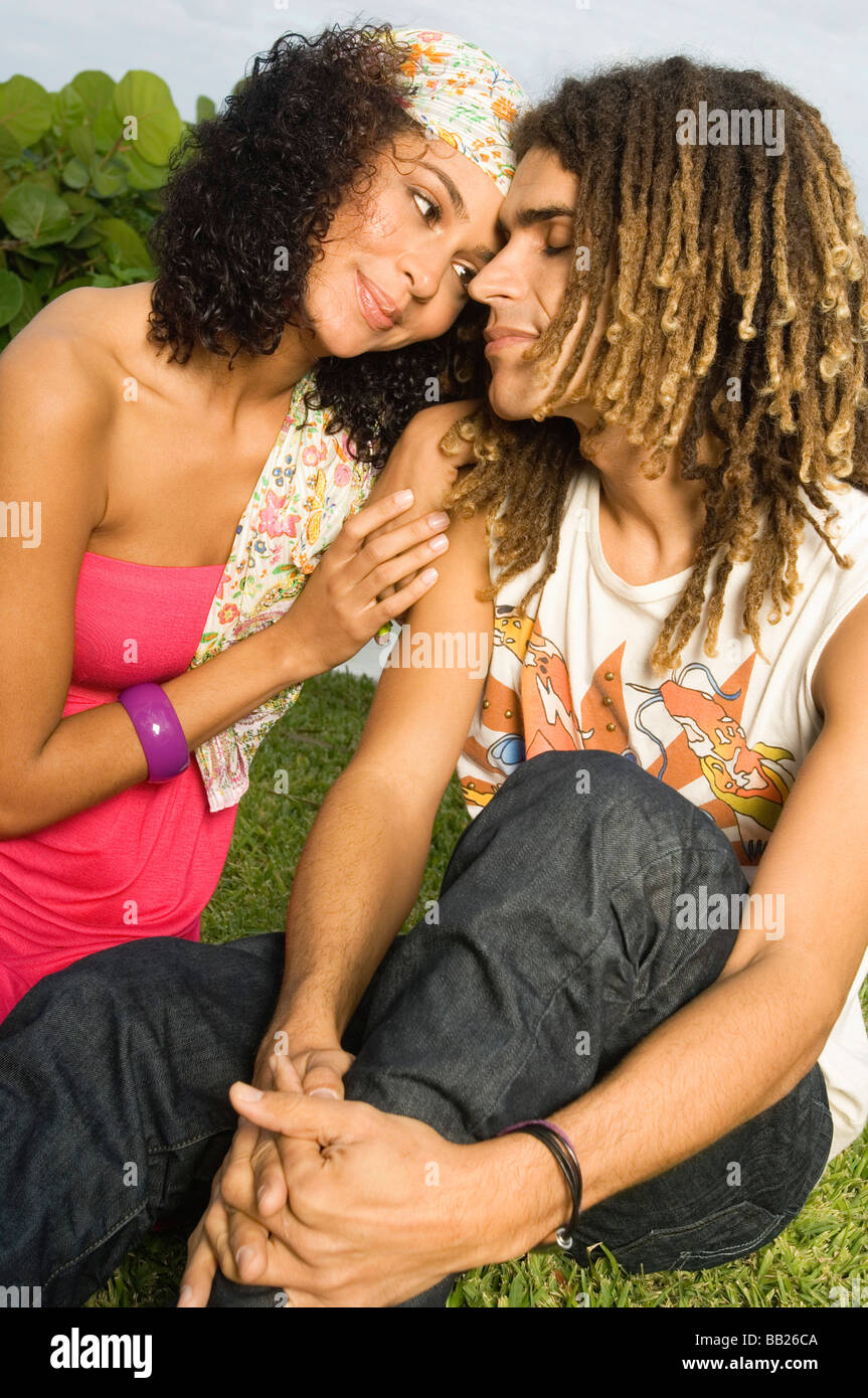Couple with dreadlocks hugging hi-res stock photography and images - Alamy