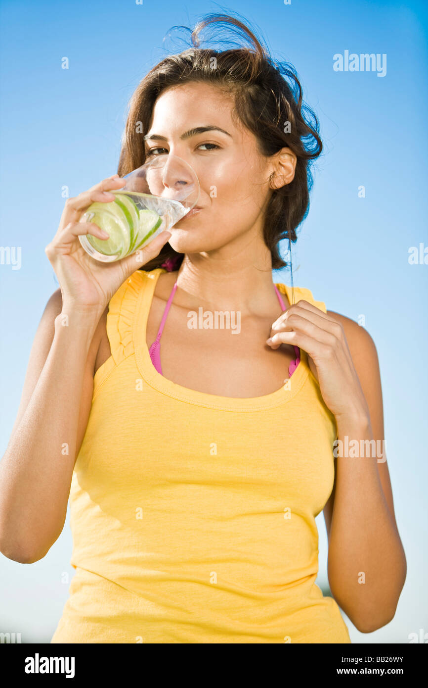 Portrait of a woman drinking lemonade Stock Photo Alamy