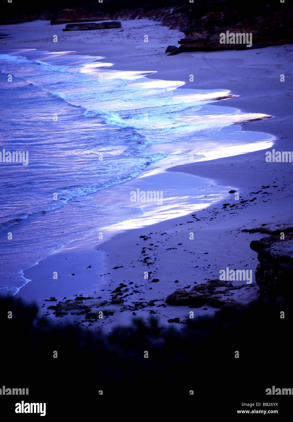 Sandy beach waves hi-res stock photography and images - Alamy