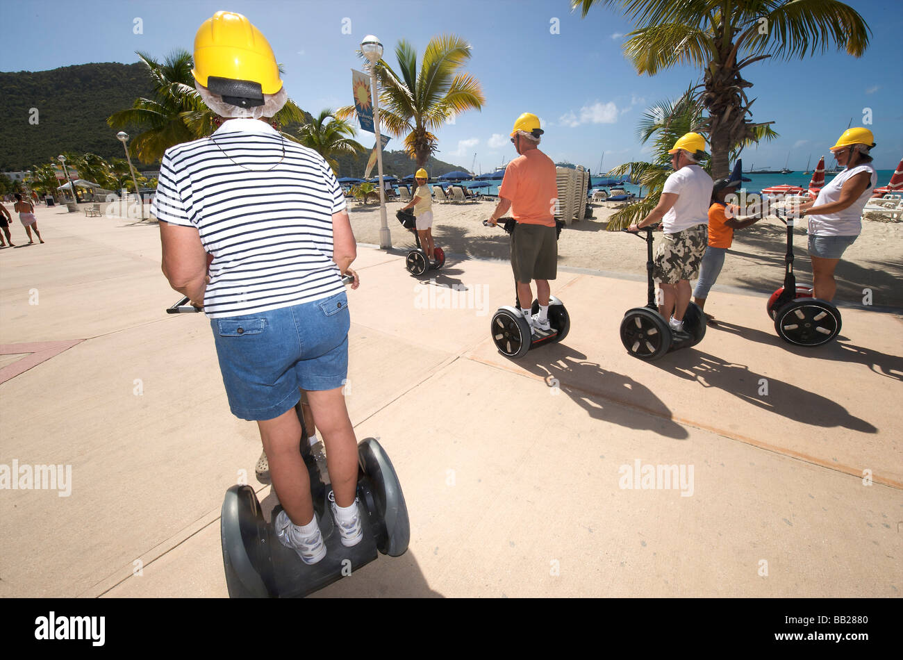 Sint Maarten Philipsburg cruise ship passengers on a Segway excursion on the boardwalk Stock Photo