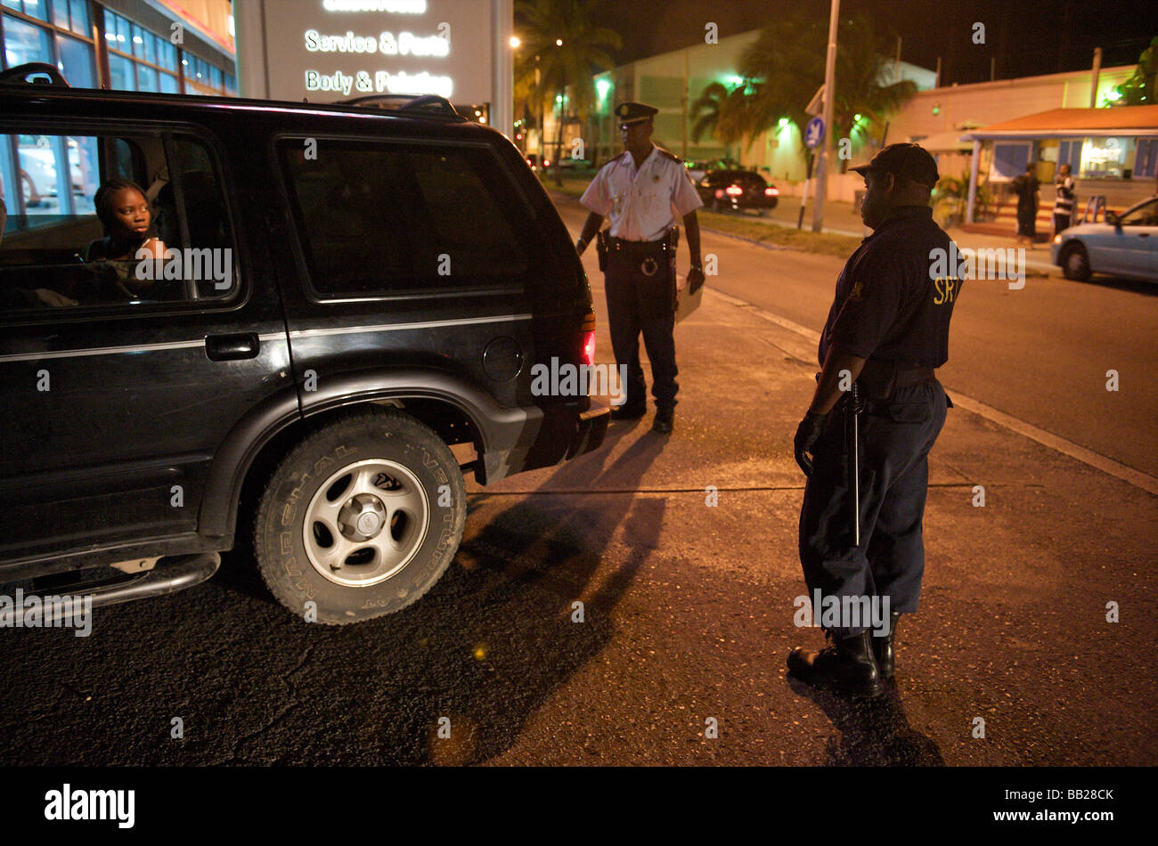 Sint Maarten Philipsburg the Zero Tolerance Team stopping cars at night Stock Photo