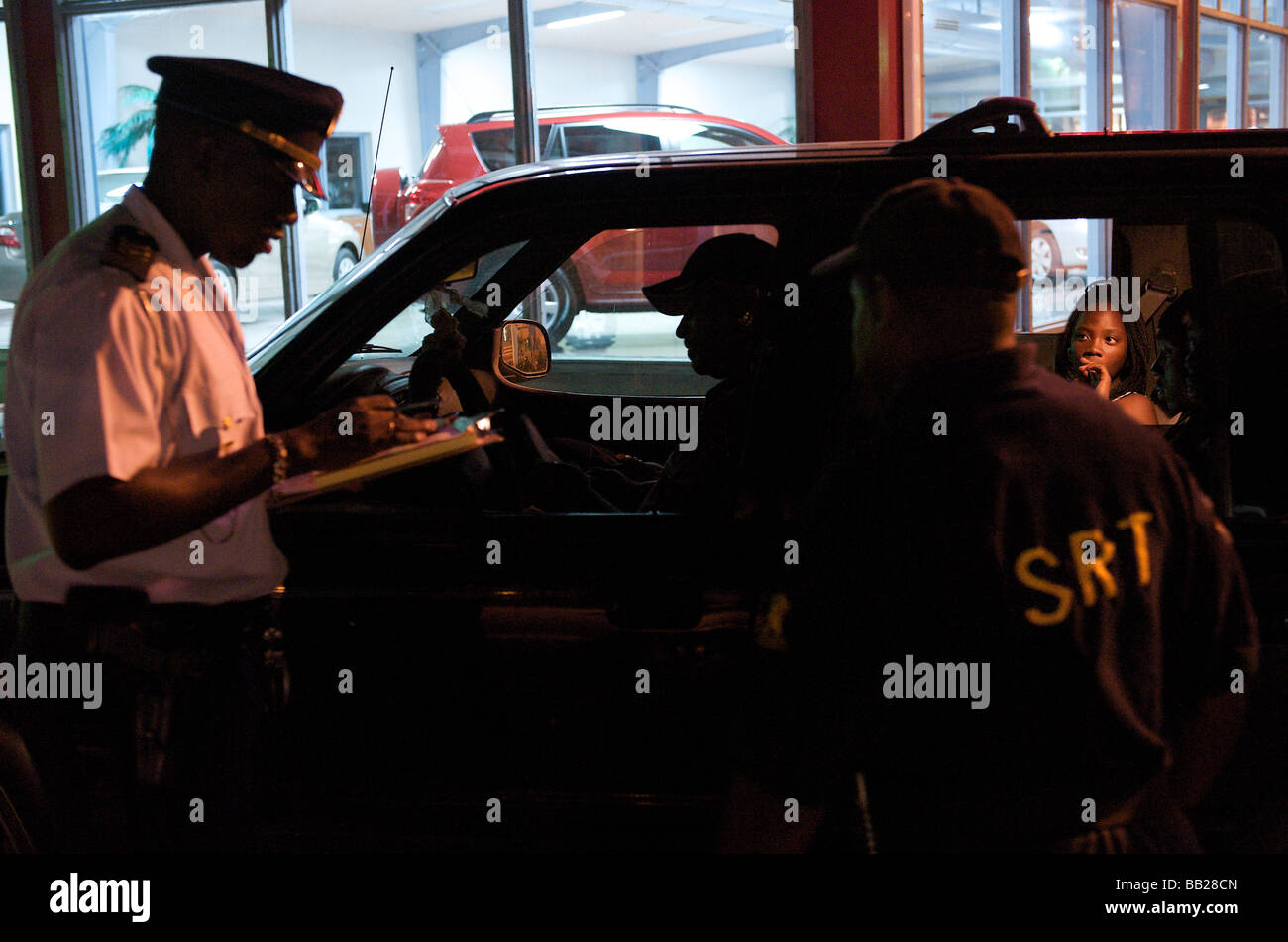 Sint Maarten Philipsburg the Zero Tolerance Team stopping cars at night Stock Photo