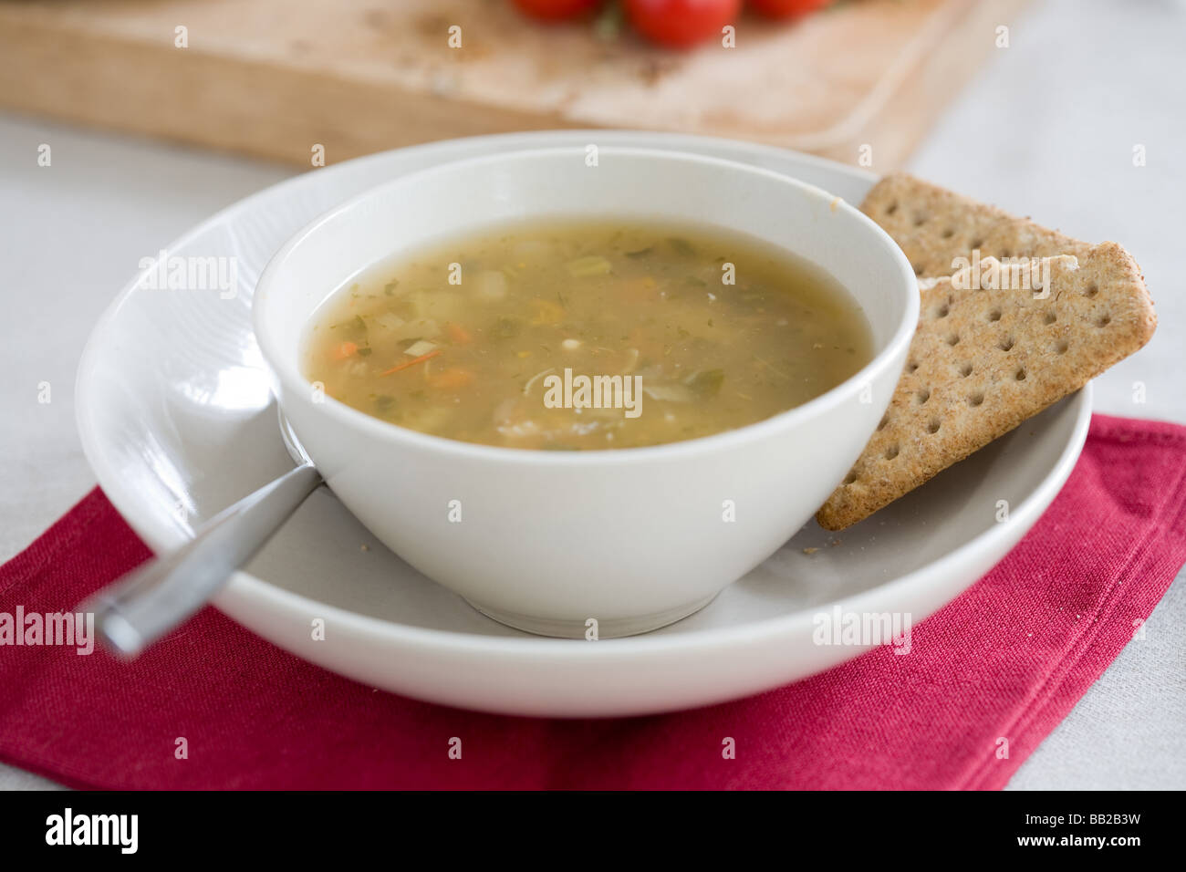 Bowl of vegetable soup served with crackers Stock Photo Alamy