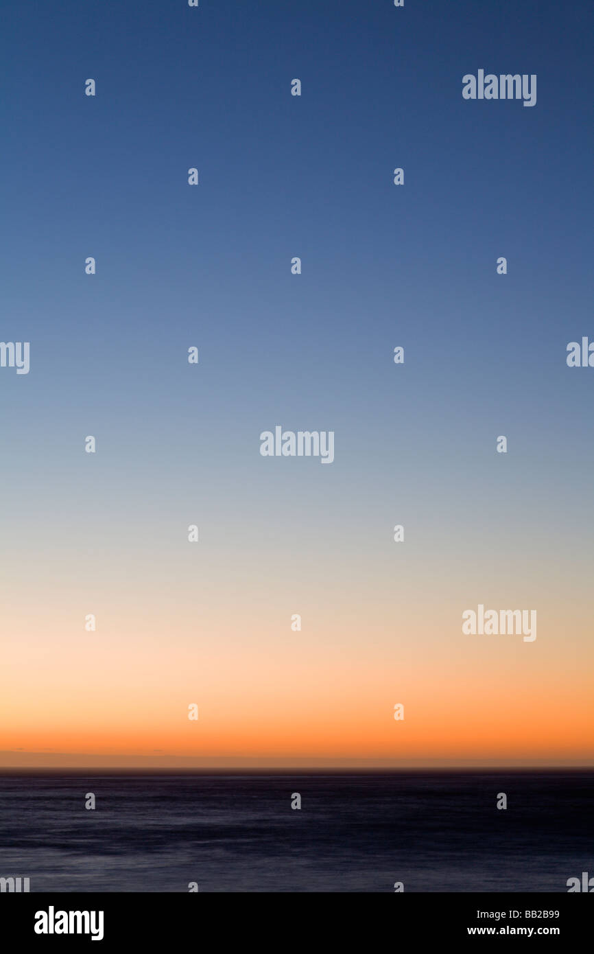 Sunset over Water Stock Photo - Alamy