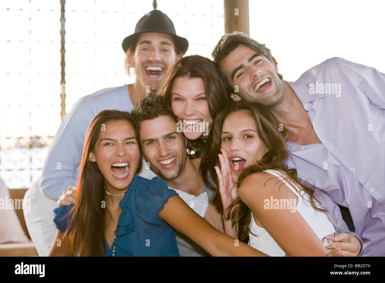 Group of friends smiling together Stock Photo - Alamy