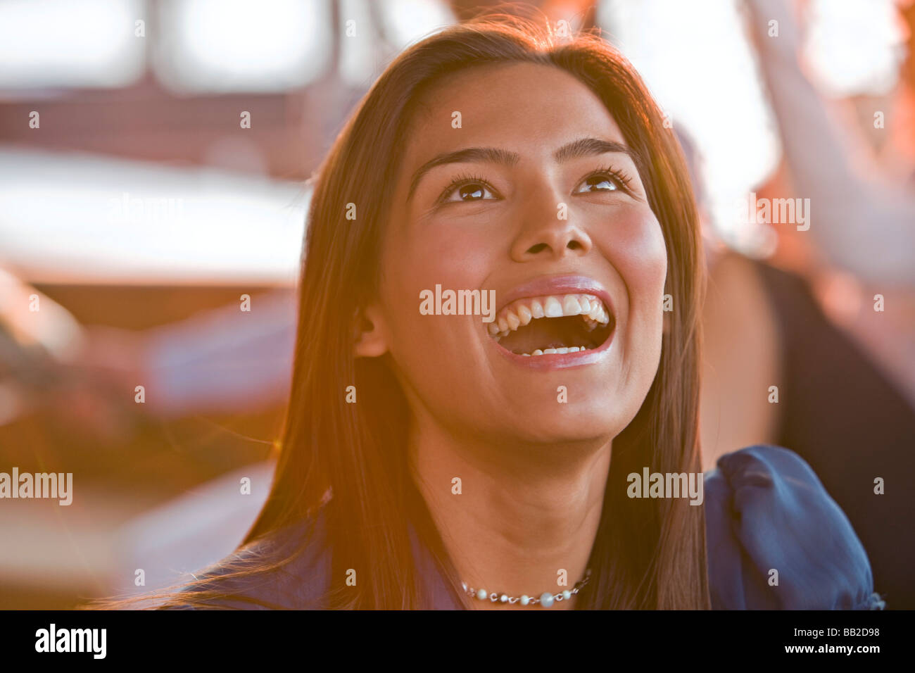 Beautiful young woman black hair laughing hi-res stock photography and ...
