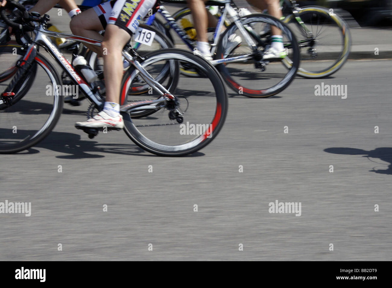 professional bike riders in road street race in city town Stock Photo ...