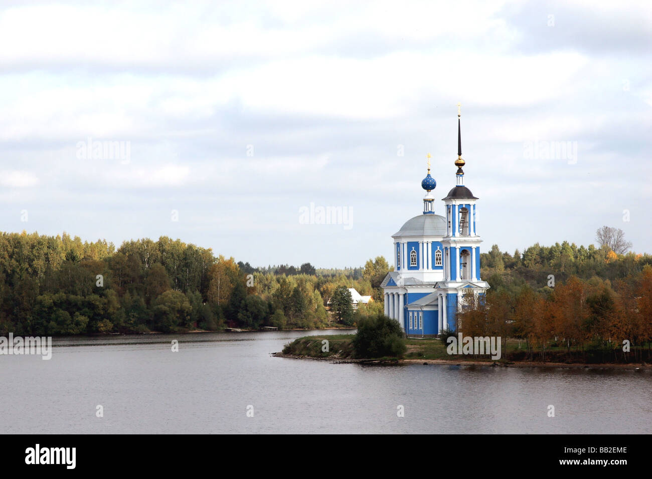 Church on river bank Stock Photo - Alamy