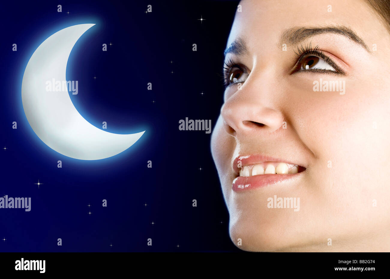 Portrait of a beautiful happy woman at night moon created in PS Stock Photo