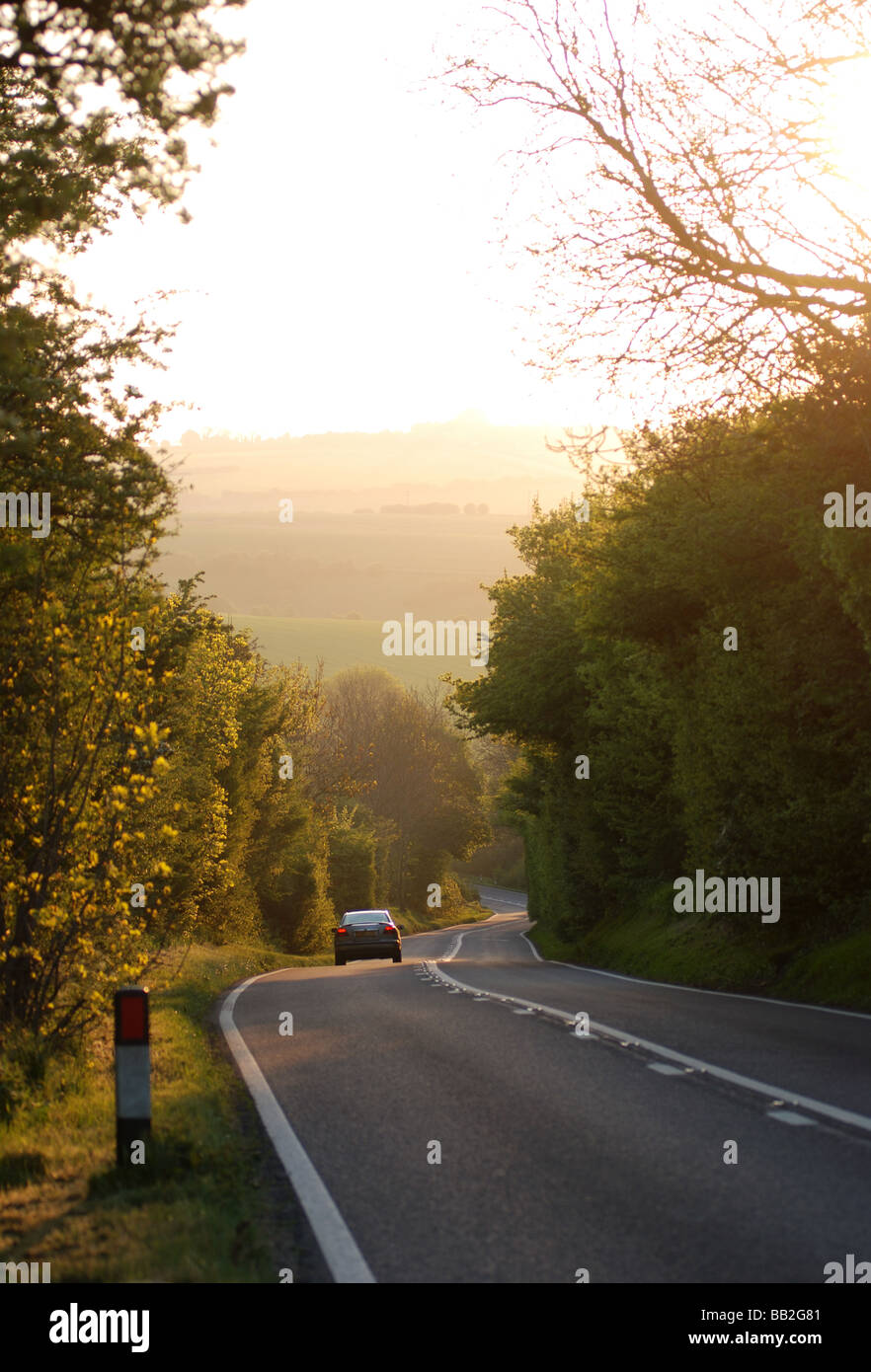 The Fosse Way at dawn near Farmington, Gloucestershire, England, UK Stock Photo