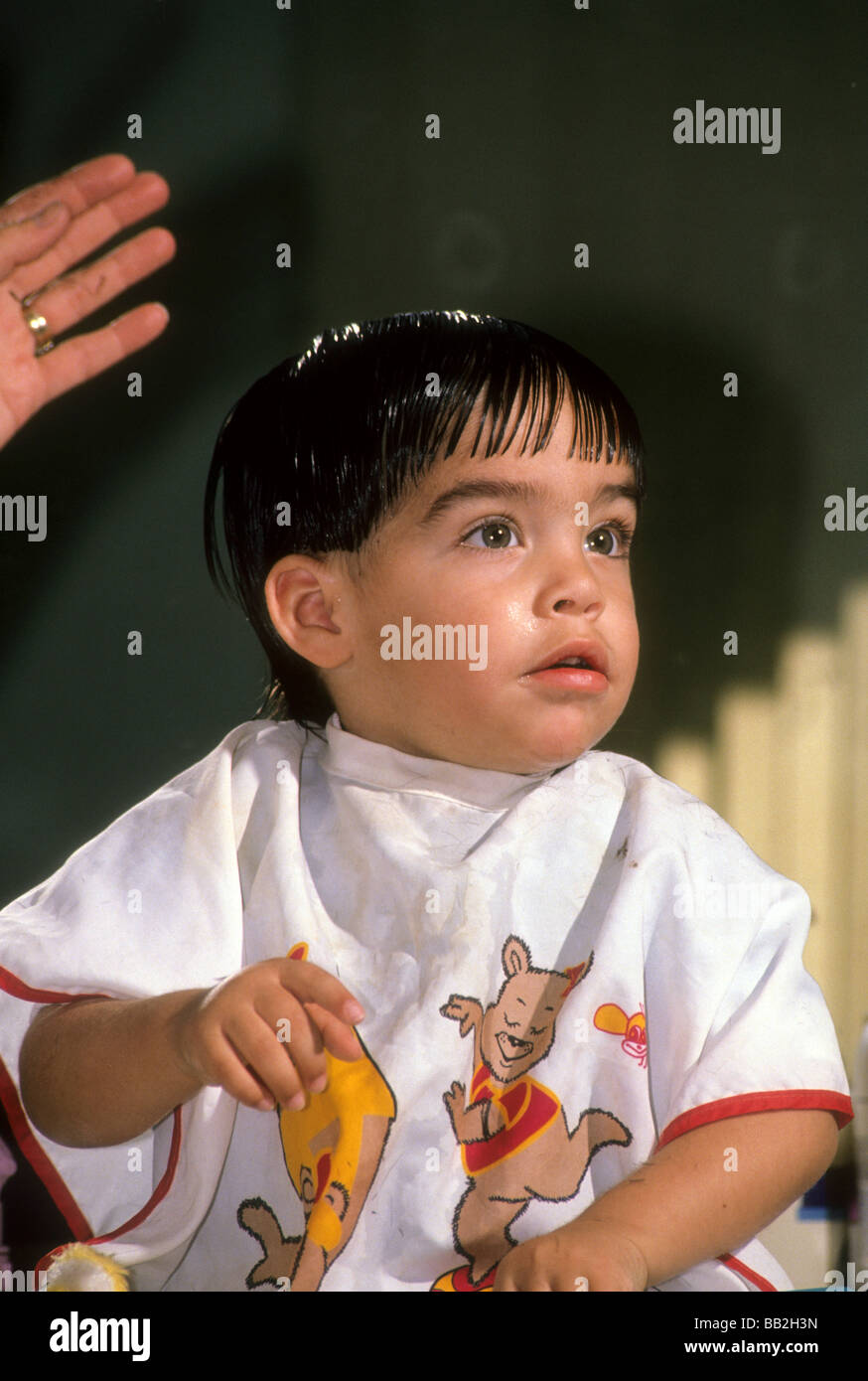 One Year Old Hispanic Boy First Haircut Learn Grow