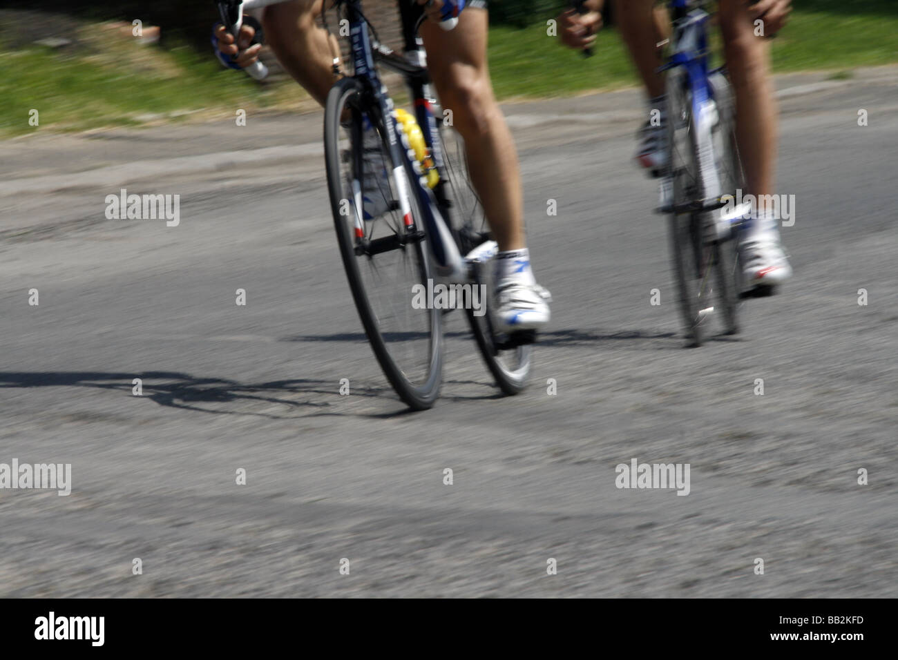Two professional male cyclists hi-res stock photography and images - Alamy