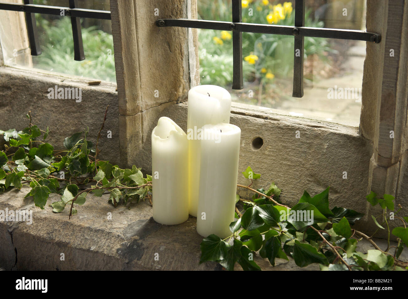 Candles on window sill Stock Photo Alamy