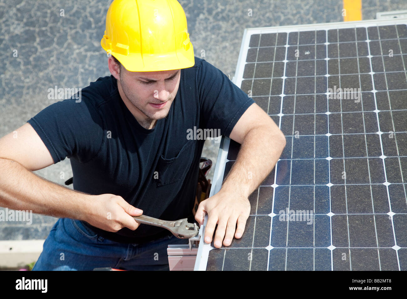 Apprentices Solar Solar panel installation apprentice hi-res stock photography and images ...