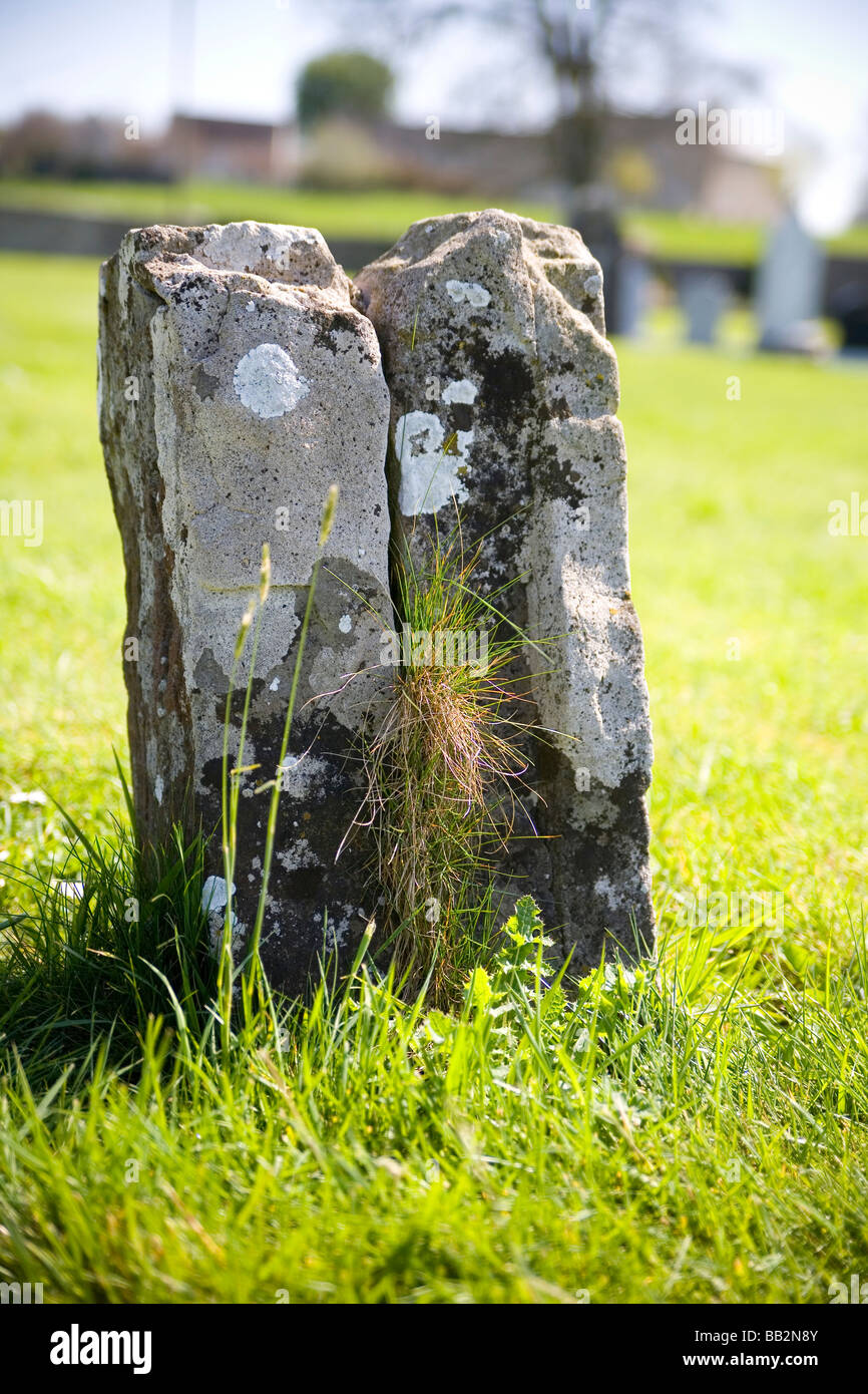 Old stone grave marker in a graveyard in a cemetery in Western Ireland Stock Photo Alamy