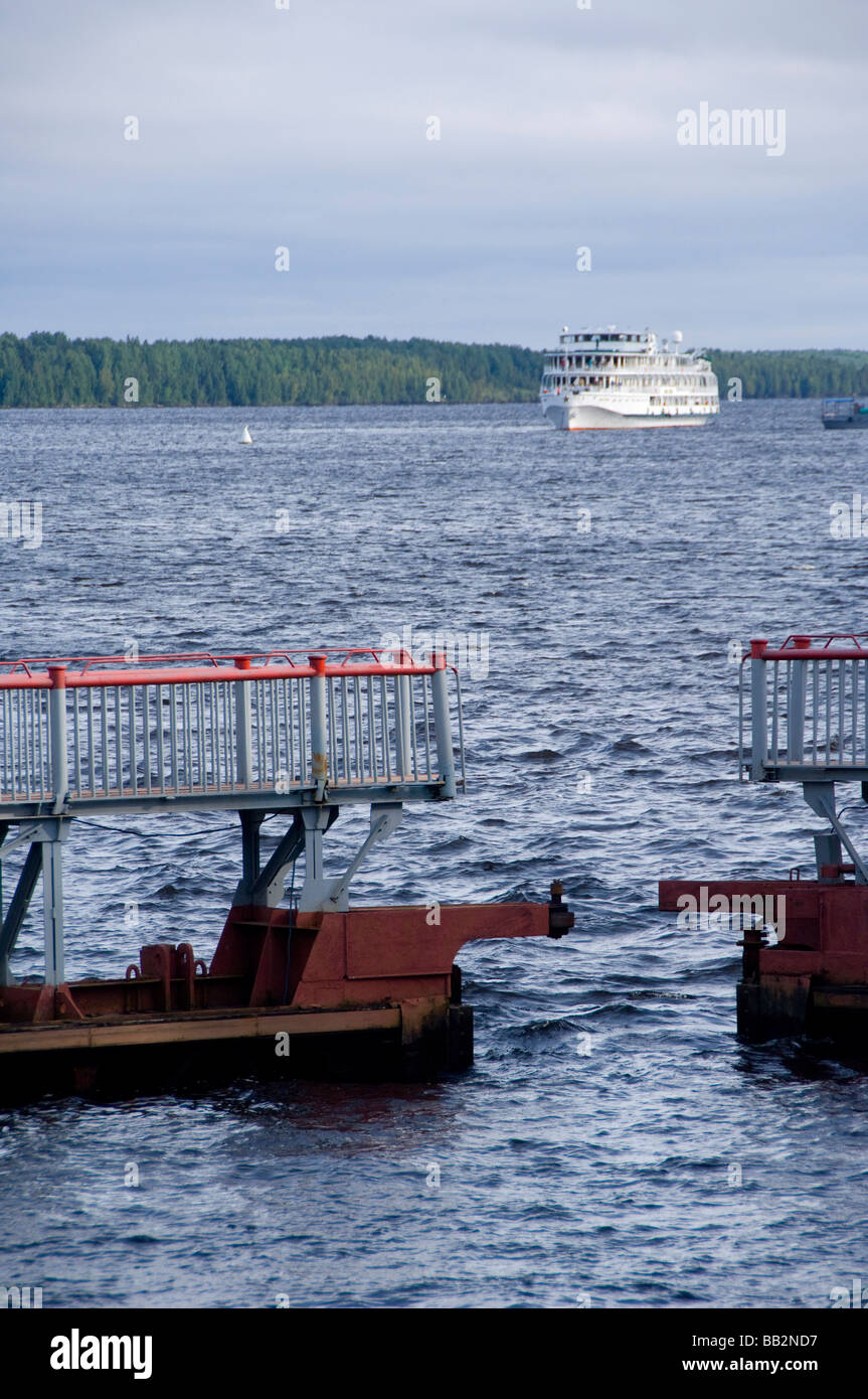 Russia, Svir River (aka The Blue Route), lock area. Riverboat waiting to enter lock. Lock gates closing. Stock Photo