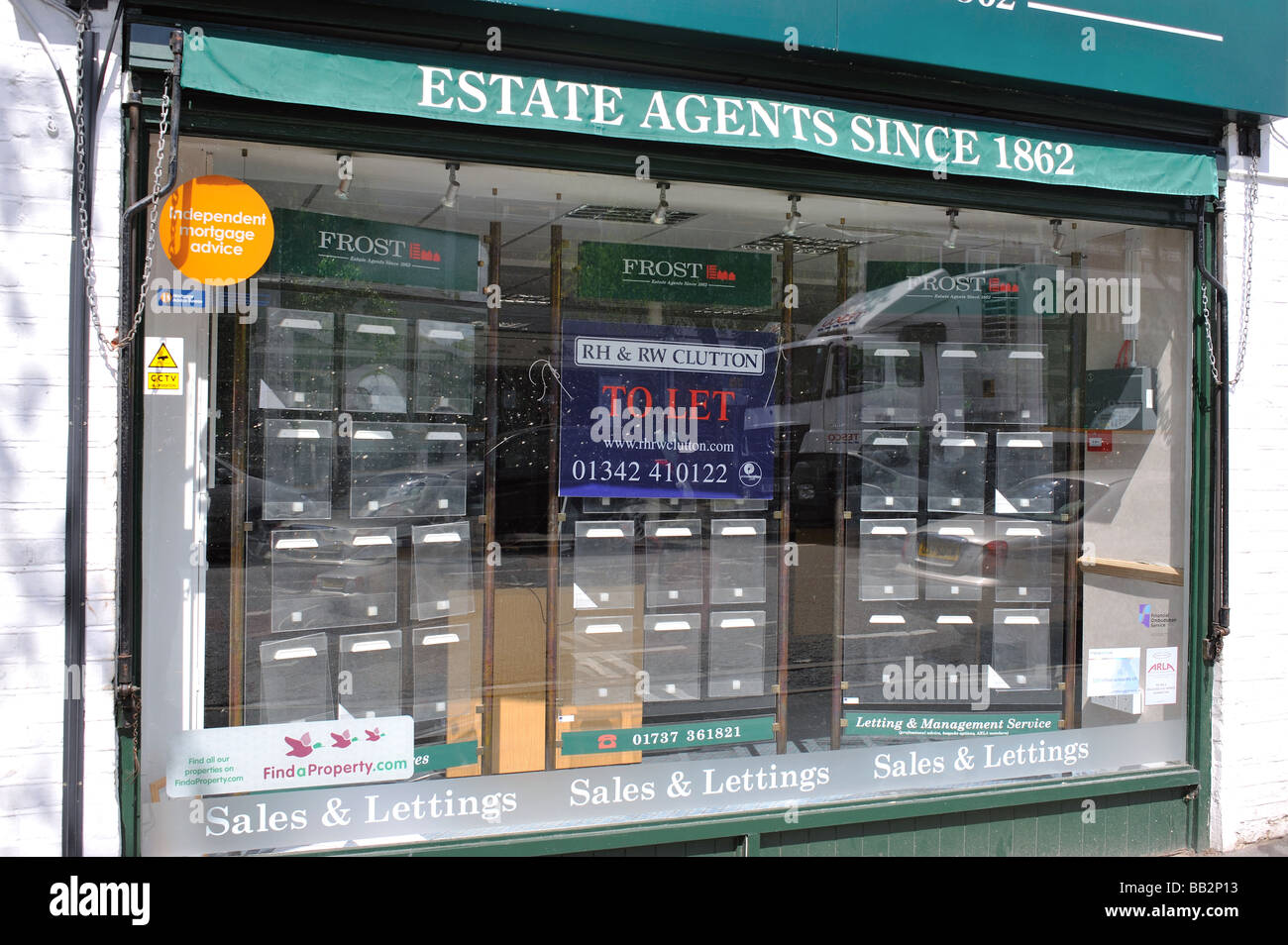 A closed down Estate Agents Shop Banstead Surrey UK Stock Photo Alamy