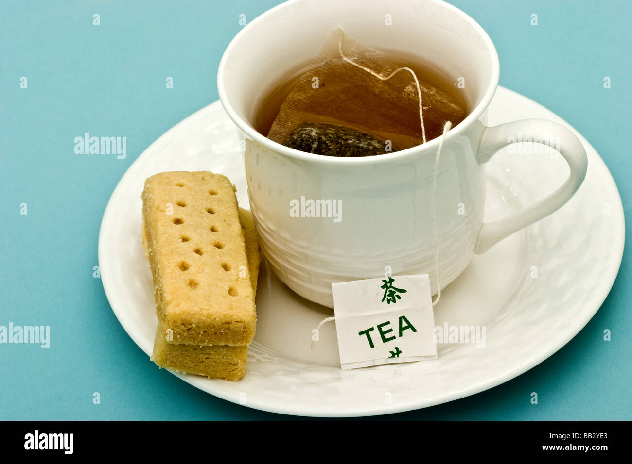 Cup of tea with shortbread biscuit Stock Photo Alamy