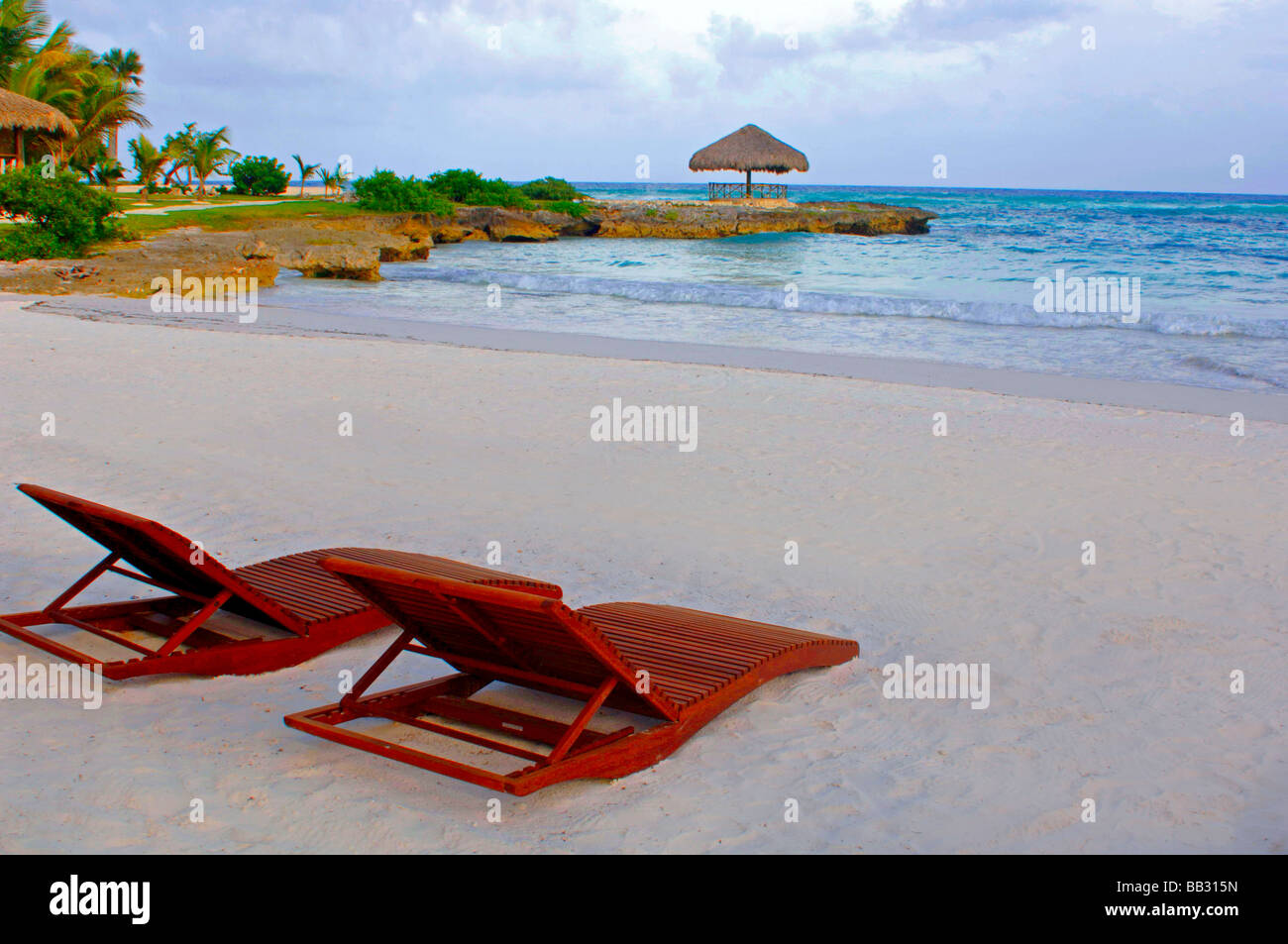 Gentle waves and breeze caress the beautiful tropical resort beach in the Caribbean ocean on the Dominican Republic coastline Stock Photo