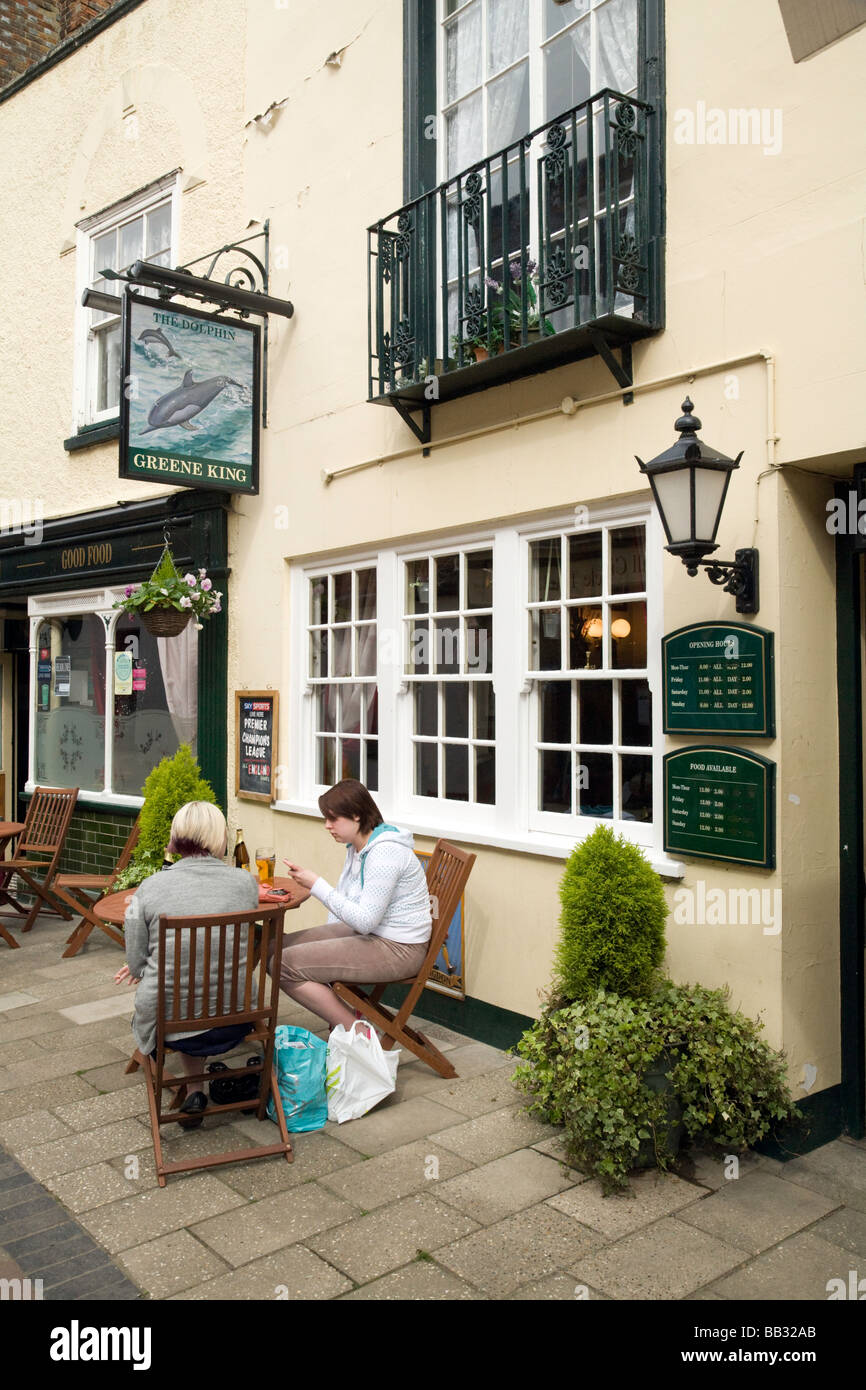 People drinking outside the Dolphin pub, Wallingford, Oxfordshire