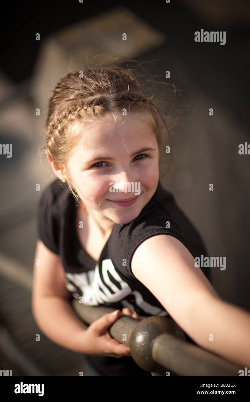 Happy smiling pretty young nine ten eleven year old girl child Stock Photo