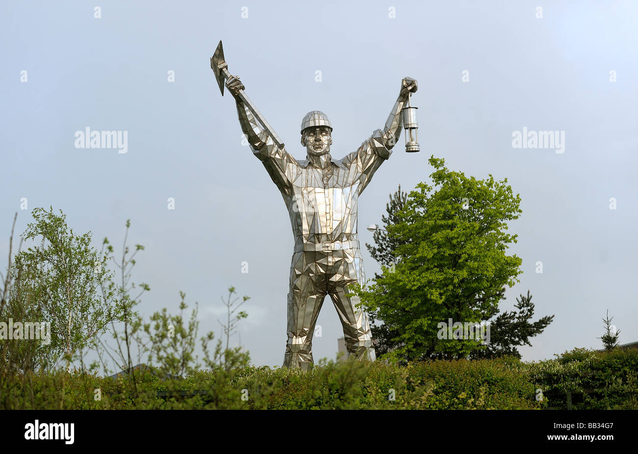 A landmark 30 foot high sculpture of a miner, made by John McKenna in Brownhills High Street. Stock Photo