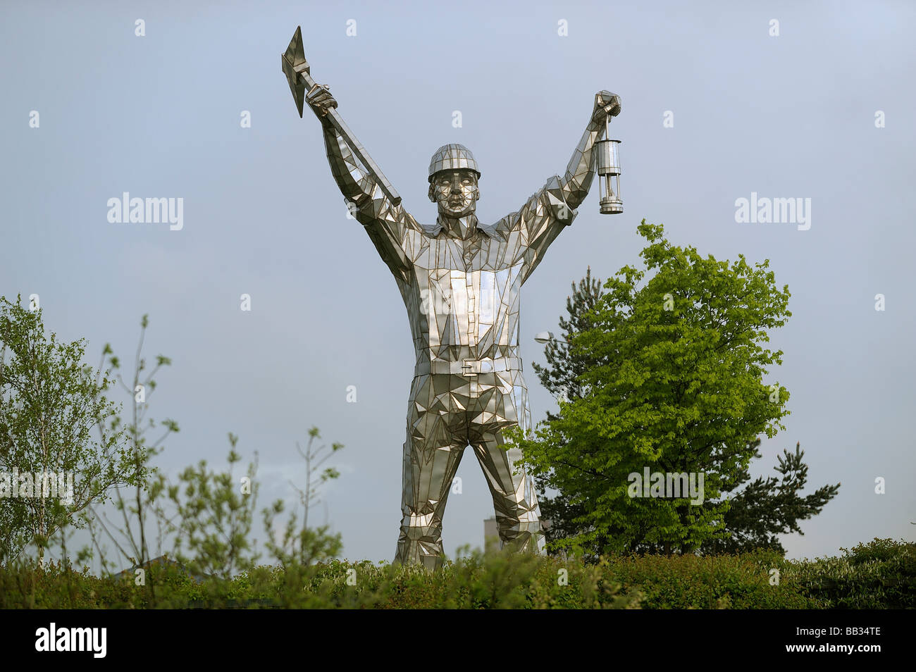 A landmark 30 foot high sculpture of a miner, made by John McKenna in Brownhills High Street. Stock Photo