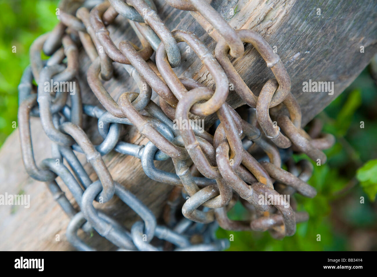 Chain round a post. Styal, Cheshire, United Kingdom. Stock Photo