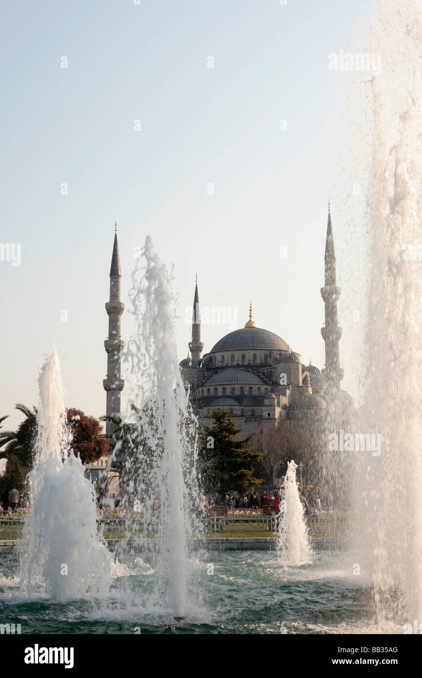 Blue Mosque viewed through the fountains of Sultanahmet in Istanbul ...