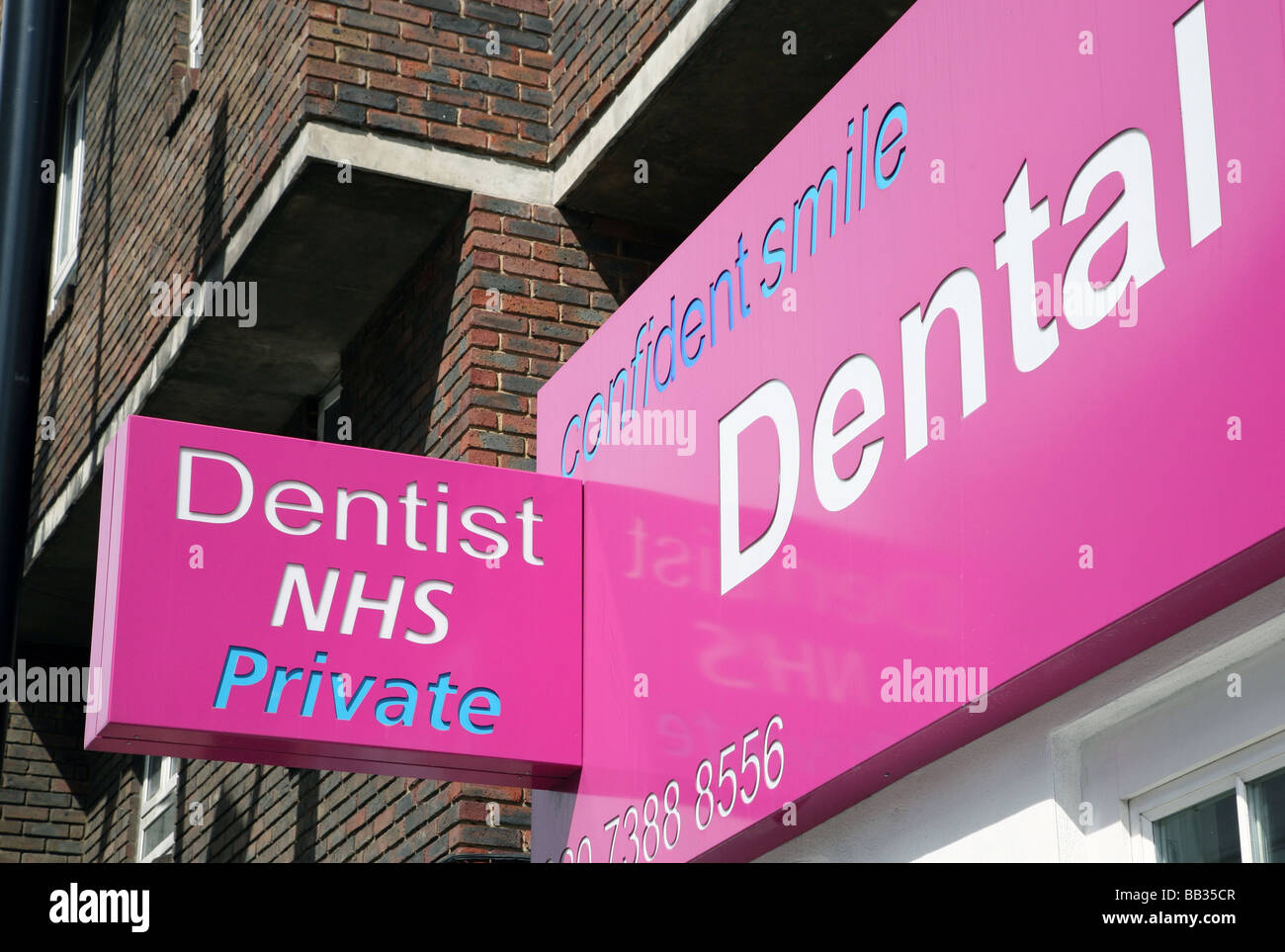 Sign on dentist's surgery central London Stock Photo Alamy
